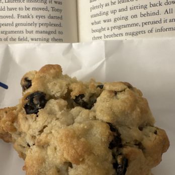 Levain Bakery - Oatmeal raisin cookie with two bites out of it. Huge, but worth it! - Bakeries Near Me - Chicago, Illinois