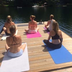 Power Yoga Canada Muskoka - Private dock yoga class with Jenn on Clear Lake.