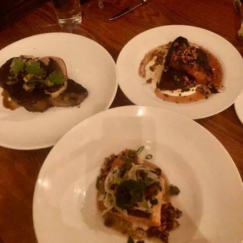 Photo of Decca - Louisville, KY, United States. Rib eye, salmon entrees Plus sweet potato side dish to die for