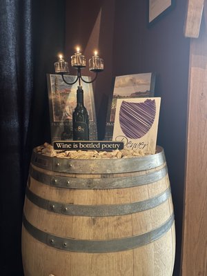 Photo of Icon Cellars - Woodinville, WA, US. a wine barrel with a candle and wine bottle