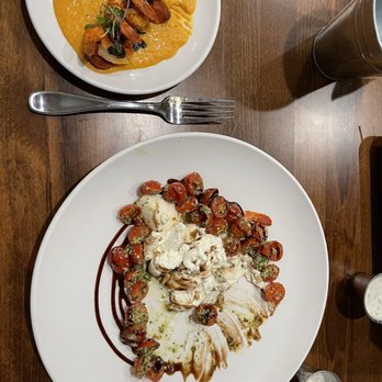 The Farmhouse Cafe - Shrimp and grits appetizer and caprese salad which took almost one hour to arrive. :( - American Near Me - Cheney, Washington