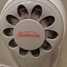 The hair dryer in bathroom, covered in dust and dirt! All clogged up. The hair dryer in bathroom, covered in dust and dirt! All clogged up.