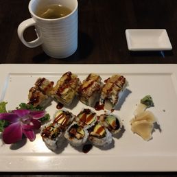 Eel avocado roll $7.50 (front), Monster roll ~$17 (rear)