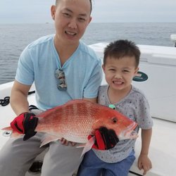 Captain Daddy's Fishing Charter - Cat Daddy loves putting the youth on nice fish.