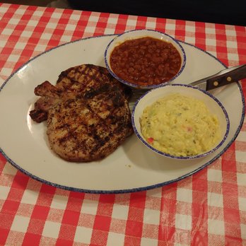 Mia's Table - Pork chops with baked beans and potato salad - American Near Me - Houston, Texas Mia's Table - Pork chops with baked beans and potato salad - American Near Me - Houston, Texas