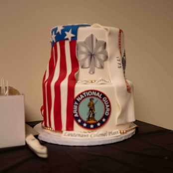 Delicate Creations - a patriotic cake on a table - Cupcakes Near Me