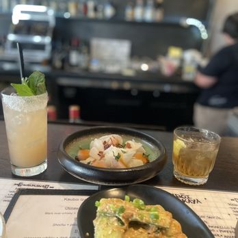 Kauboi Izakaya - Cucumber salad  Hamachi with pear  Drinks: Okinawan Old Fashoned Salty Inu - Japanese Near Me - Reno, Nevada