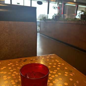 Nizza Pizza - a red cup on a table - Pizza Near Me - Colleyville, Texas Nizza Pizza - a red cup on a table - Pizza Near Me - Colleyville, Texas
