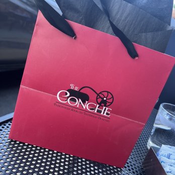 The Conche - Some delicious chocolates inside of this beautiful bag - Cocktail Bars Near Me - Leesburg, Virginia