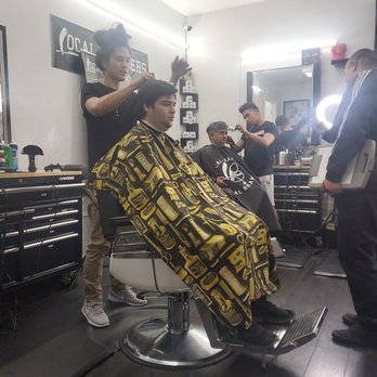 Local Barbers - Barber Chino working on client in the shop. - Barbers Near Me - Long Beach, California