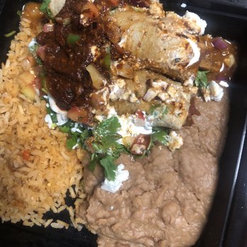Que Onda Tacobar - Two grilled chicken enchiladas - Tacos Near Me - Vacaville, California Que Onda Tacobar - Two grilled chicken enchiladas - Tacos Near Me - Vacaville, California