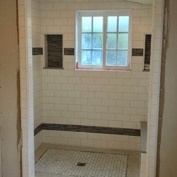 Edsberg Tile & Stone - a shower with a window - General Contractors Near Me - San Jose, California