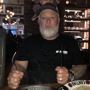 Calaveras Cantina - Love him. He's ready to grub. But in the background you can see the decor. It's so cool. - Mexican Near Me - Jupiter, Florida Calaveras Cantina - Love him. He's ready to grub. But in the background you can see the decor. It's so cool. - Mexican Near Me - Jupiter, Florida
