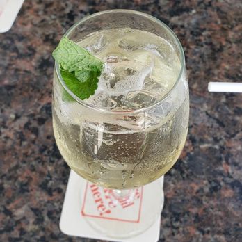 Bon Appetit - Hugo. It's refreshing and perfect for a hot sunny Sunday afternoon. Elderflower liquor, champagne and fresh mint. Definitely try - New American Near Me - Dunedin, Florida
