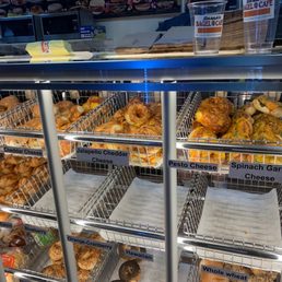 a display case full of donuts a display case full of donuts
