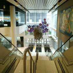 Remington Contemporary Art Gallery - Escalator and stairs that lead from the movie theatre to the main lobby.