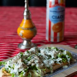 Flavors of Morocco - "The Bnina" - Our Chicken Shawarma on a Pita with our Homemade Hummus, Lettuce, White Sauce, and Chia Seeds