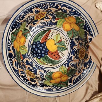 Colonial Restoration Studios - Mexican Ceramic Bowl broke when metal water bottle fell out cabinet, before repair and restoration. - Furniture Repair Near Me - Gaithersburg, Maryland