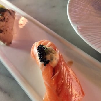 KAI ZAN - Salmon nigiri. Kai Zan could improve its sushi rice (シャリ). It doesn't have vinegar in it so the taste is a little too greasy. - Asian Fusion Near Me - Chicago, Illinois
