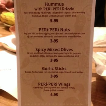 Nando's Peri-Peri - Appeteasers  .....the wings, garlic sticks and spicy nuts. Are seriously all I need when I come here - Portuguese Near Me - Gambrills, Maryland