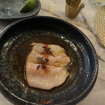 Toca Madera - Hamachi crudo. We already ate 2 before I snapped the photo - Steakhouses Near Me - Houston, Texas