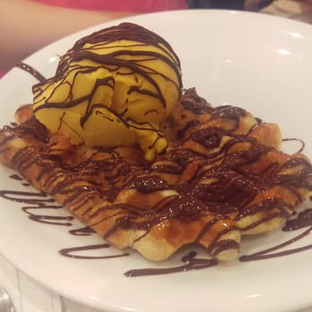 Wafflemeister - "Dream Team" - a standard Belgian Waffle with a mango gelato scoop and brilliant chocolate decoration - Desserts Near Me - Kingston upon Thames, XGL