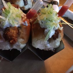 Awesome chicken sandwiches with adorable hot sauce and blue cheese topping