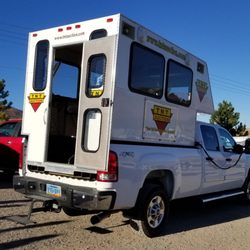 Tnt Auction- Salt Lake City - Mobile unit that the auctioneer uses