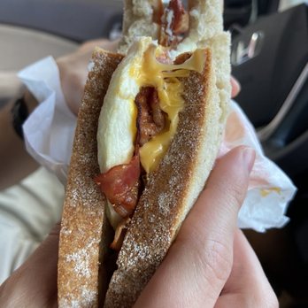 Dunkin' - Sweet black pepper bacon sandwich. They were out of croissants and used American cheese instead of white cheddar. - Coffee & Tea Near Me - Wildwood, Florida