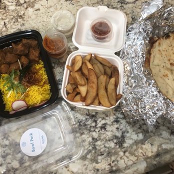 Bhuna - Deliciousness -crispy potatoes, naan, chettinad chicken and goan pork vindaloo - Indian Near Me - Portland, Oregon Bhuna - Deliciousness -crispy potatoes, naan, chettinad chicken and goan pork vindaloo - Indian Near Me - Portland, Oregon