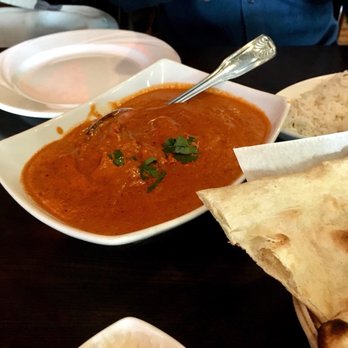 Mild 2 Spicy - Butter Chicken and naan. Naan was a bit too crunchy for my taste. I like a really soft pillowy naan - Indian Near Me - Chicago, Illinois Mild 2 Spicy - Butter Chicken and naan. Naan was a bit too crunchy for my taste. I like a really soft pillowy naan - Indian Near Me - Chicago, Illinois