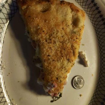 Pat's Pizzeria - Ithaca - a slice of pie on a plate - Pizza Near Me - Ithaca, New York