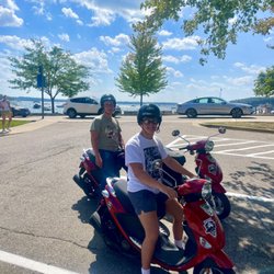 Lake Geneva Scooter Tours & Rentals - Pause from riding at Lake Geneva waterfront.