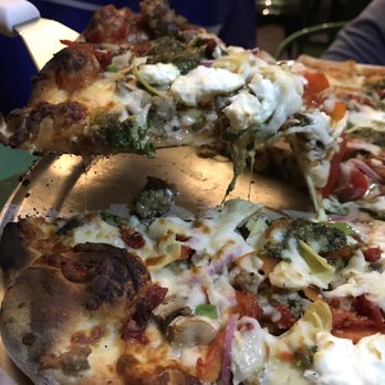 Wild Tomato - Veggie pizza with sausage on half - Pizza Near Me - Fish Creek, Wisconsin