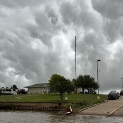 Red River South Marina and Resort - The back of the marina from the water. Trying to beat those rain clouds. We did not succeed. I did catch a Bass before turning back.