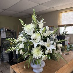 Urban Florist - Funeral side spray in urn container