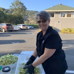 Mama Laura making Caesar salad for an event