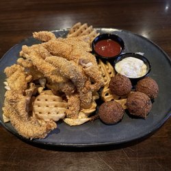 Walk-On's Sports Bistreaux - Tyler Restaurant - Fried catfish with waffle fries and hush puppies
