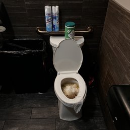 Restroom was disgusting . Restroom was disgusting .