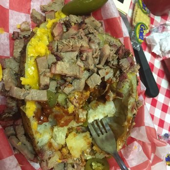 Bare Bones BBQ - Stuffed Baked Potato with Brisket  They don't skimp...it's Big & Beautiful!! - Barbeque Near Me - Gatesville, Texas