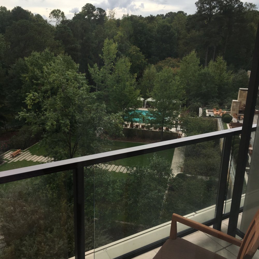 The Umstead Hotel - Balcony with woods and pool view - Hotels Near Me - Cary, North Carolina The Umstead Hotel - Balcony with woods and pool view - Hotels Near Me - Cary, North Carolina