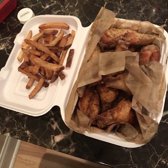 Wingstop - Half lemon pepper and half Louisiana rub and seasoned fries - Chicken Wings Near Me - Rockville, Maryland Wingstop - Half lemon pepper and half Louisiana rub and seasoned fries - Chicken Wings Near Me - Rockville, Maryland