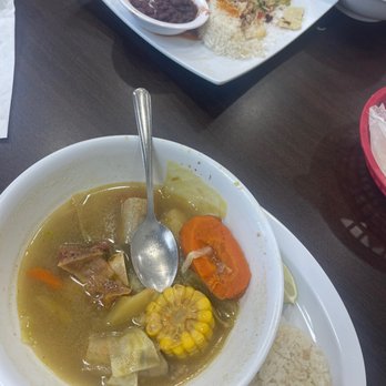 Coco Bahia - a bowl of soup with a spoon in it - Seafood Near Me - Houston, Texas