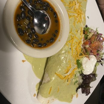 Tequila Sunrise - Chicken Burrito with Cilantro Cream, served with beans - Mexican Near Me - Fishers, Indiana Tequila Sunrise - Chicken Burrito with Cilantro Cream, served with beans - Mexican Near Me - Fishers, Indiana