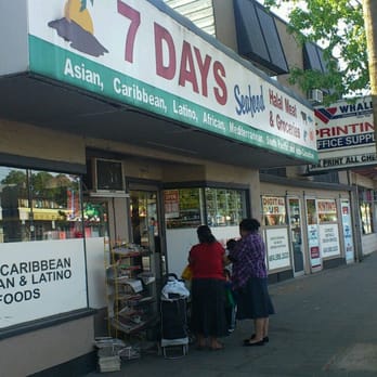 Seven Days Seafood & Grocery - two people standing in front of the store - Seafood Markets Near Me - Surrey, British Columbia Seven Days Seafood & Grocery - two people standing in front of the store - Seafood Markets Near Me - Surrey, British Columbia