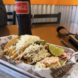 El Dorado tacos without créame with a bottled Coke. El Dorado tacos without créame with a bottled Coke.