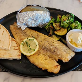 Acropolis - Redfish with Veggies & Baked Potato - Greek Near Me - Metairie, Louisiana Acropolis - Redfish with Veggies & Baked Potato - Greek Near Me - Metairie, Louisiana