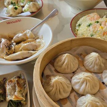 Mian & Bao - chili oil dumplings are the ones in the middle with the spoon sticking out. and of course the xiao long bao, lower right. - Dim Sum Near Me - Honolulu, Hawaii Mian & Bao - chili oil dumplings are the ones in the middle with the spoon sticking out. and of course the xiao long bao, lower right. - Dim Sum Near Me - Honolulu, Hawaii