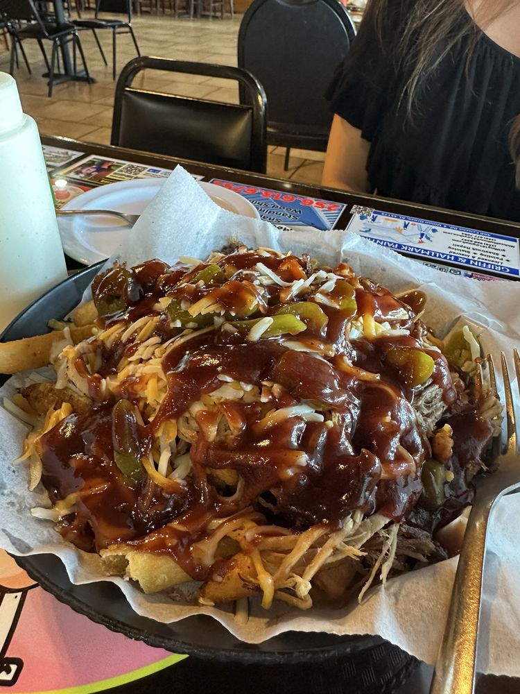 Burnt Knuckles Grill Logo