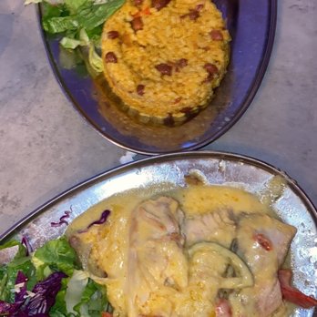 La Parrilla - Fresh Mahi mahi with a cream sauce, fried pork with rice and beans - Latin American Near Me - Luquillo, Puerto Rico La Parrilla - Fresh Mahi mahi with a cream sauce, fried pork with rice and beans - Latin American Near Me - Luquillo, Puerto Rico